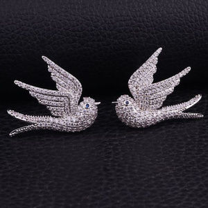 Costume diamond Dove earrings.